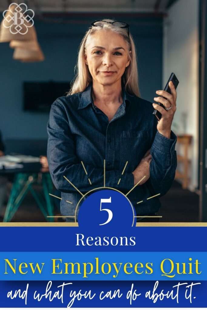 Business owner holding a phone with a confident look about how she will prevent new employees from quitting.